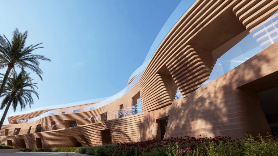 Layered terracotta facades within Mira Coral Bay