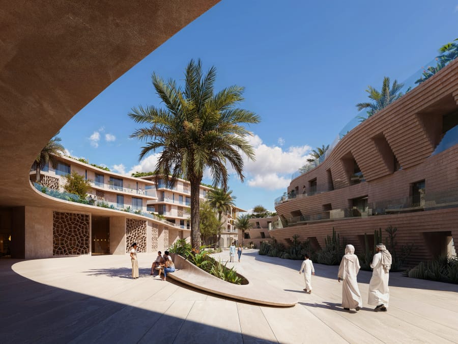 The pedestrian plaza above the shared podium at Mira Coral Bay
